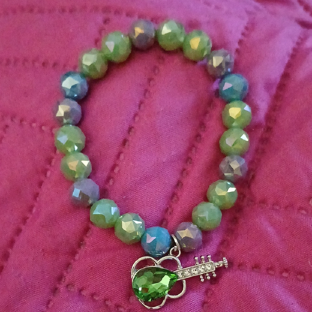 Green Beaded Bracelet with Guitar Charm